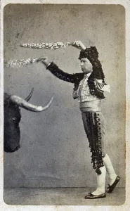 Tassel Prints: Bullfighting. Occupational portrait of a matador aiming banderillas at a stuffed bull's head