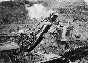 Workers Prints: Business end of 95 ton steam shovel loading boulders onto train cars at the Panama Canal