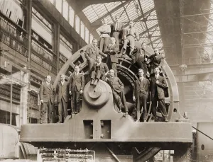 Pittsburgh Prints: Businessmen pose on a giant Westinghouse electrical generator in Pittsburgh