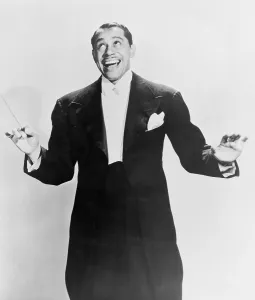 Big Band Prints: Cab Calloway (1907-1994), flamboyant African America bandleader holding conductor's baton