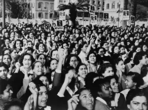 Suffrage Prints: Cairo suffragettes, some carry placards with photographs of Gamal Abdel Nasser