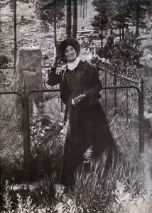 Grave Prints: Calamity Jane (Martha Jane Burke) (1852-1903) at the grave of Buffalo Bill in 1900