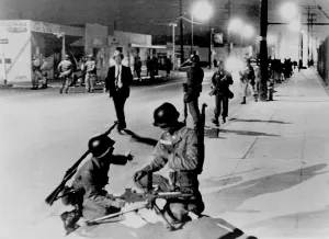 Riots Prints: California National Guardsmen take up positions a street in the Watts section of Los Angeles during race riots