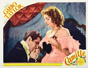 Holding Hands Prints: CAMILLE, US lobbycard, from left: Robert Taylor, Greta Garbo, 1936