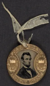 Button Prints: Campaign button for 1864 presidential election showing bust tintype portrait of Abraham Lincoln in a metal casing