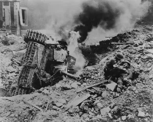 Tanks Prints: Canadian soldier is attended by a medic near Falaise