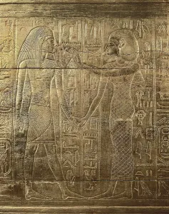Canopic chest of Tutankhamun. 1333 BC. Detail, one relief. Inside the chest there was another alabaster chest with canopic vases. Golden wood. From the treasure of Tutankhamun