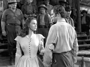 Grabbing Arm Prints: CANYON PASSAGE, Susan Hayward, Dana Andrews, 1946