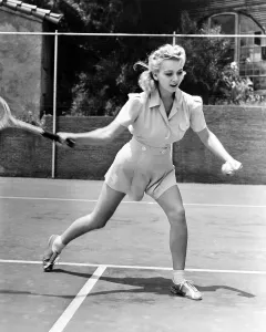 Tennis Racquet Prints: Carole Landis playing tennis, 1940