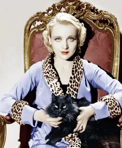 Sitting In Chair Prints: Carole Lombard, circa 1930