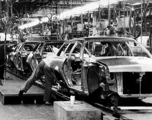 Automobile Prints: Cars move along the assembly line at the Ford plant in Metuchen