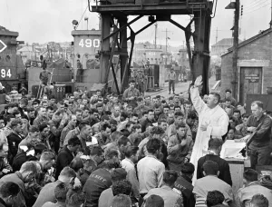 Operation Overlord Prints: Catholic chaplain conducts services on a pier for first D-Day assault troops