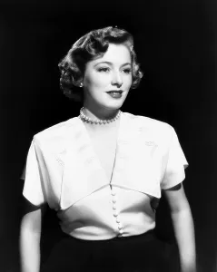 White Blouse Prints: CHAIN LIGHTNING, Eleanor Parker, in a tissue-faille crepe blouse, 1950