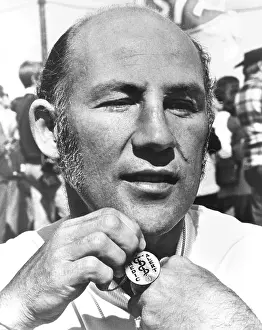 Speed Prints: Champion racing driver Sterling Moss promoting Medic Alert organ donations