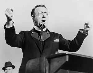 Expression Prints: Charles Coughlin, with fists raised