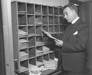 Mail Prints: Charles Coughlin looking at his mail in 1934