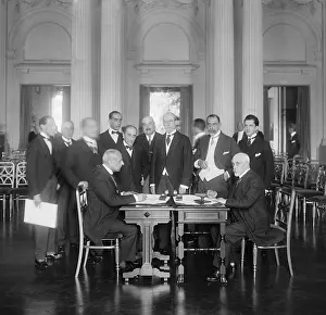 Formal Dress Prints: Charles Evans Hughes (center standing) presides at the closing of the Chile-Peruvian conference