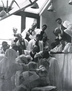 Teaching Prints: Charles H. Mayo (1865-1939), at center right in surgical gown