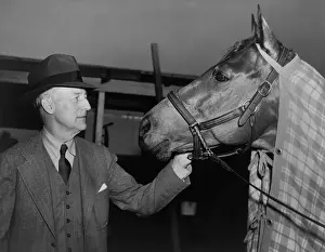 Racing Prints: Charles Howard admiring his horse Seabiscuit
