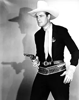 Movpor11 Prints: Charles Starrett, in one of the 65 Durango Kid films he made between 1940-52 (photo ca)