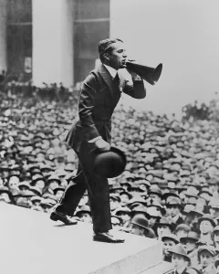 Wall Street Prints: Charlie Chaplin, speaking through a megaphone from Federal Hall, NYC, on April 9, 1918