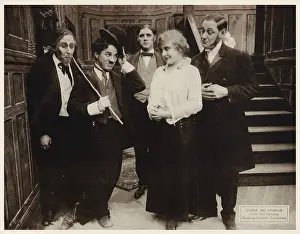 Tipping Hat Prints: CHASE ME CHARLIE, US lobbyard, second from left: Charlie Chaplin 1918