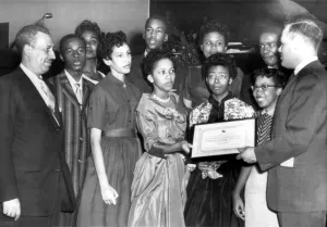 Black History Prints: Chat Patterson presents Americanism award to nine African American students who integrated Central High School