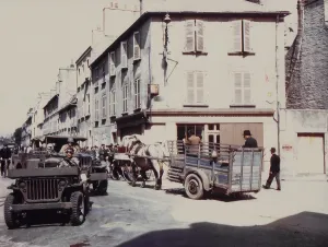 Liberation Prints: Cherbourg street traffic after liberation from German occupation
