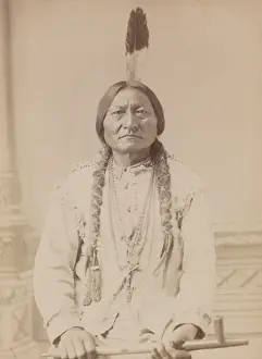 Producers Prints: Chief Sitting Bull holding peace pipe in 1885 photo