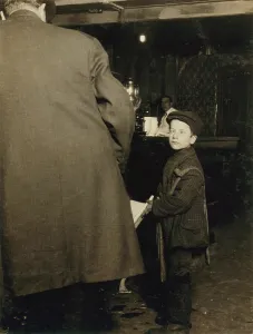 1910s Candid Prints: Child labor, newsie selling in a saloon on Washington Street at 10 P