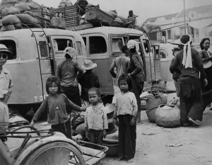 War Victims Prints: Children and adults evacuating from Nam-Dinh
