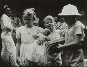 Refugees Prints: Children clutching their toys as they evacuate from Singapore before the arrival of the Japanese