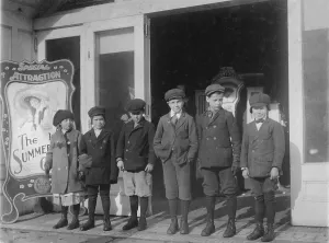 Lined Up Prints: Children at a penny arcade, original caption: Line of children found in a penny arcade at 1:30 P
