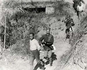Lcgr1411 Prints: Chinese Communist soldiers are taken from a tower captured by government forces