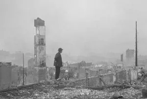 Arnold Prints: A Chinese man stands in the ruins of San Francisco's Chinatown after the April 18