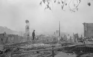 Arnold Prints: A Chinese man stands in the ruins of San Francisco's Chinatown after the April 18
