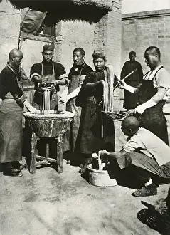 Lcgr1411 Prints: Chinese men prepare noodles in Manchuria. Ca. 1930s. - (BSLOC_2014_15_152)
