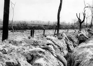 Kuomintang Prints: Chinese Nationalist soldiers in a trench awaiting Communist soldiers who were moving towards a small village rear