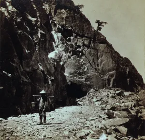 Construction Prints: Chinese railroad worker wearing traditional clothing and hats while working on the Central Pacific Railroad