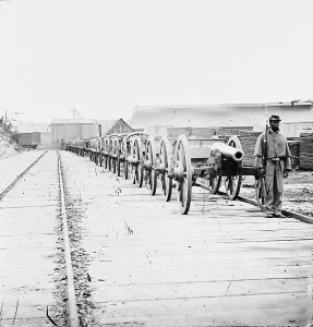 Guard Prints: The Civil War, an African American man guarding a cannon