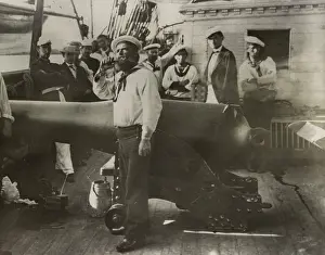 Deck Prints: US Civil War. Boatswain piping near a large cannon on deck of a Union warship, 1861-65
