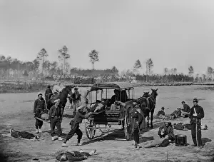 Patients Prints: US Civil War Union Zouave ambulance crew demonstrating the removal of wounded soldiers from the battle field