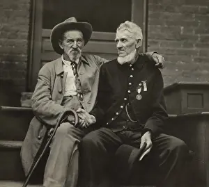 Steps Prints: Two Civil War veterans from the opposing sides, shaking hands in 1913