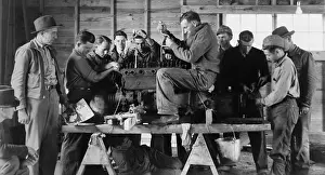 Tools Prints: Civilian Conservation Corps (CCC) class learning about a gasoline motor