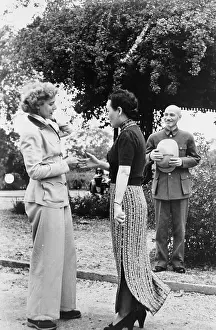 Luce Prints: Clare Boothe Luce (1903-1987) about to shake hands with Madame Chiang Kai-shek(1897-2003)