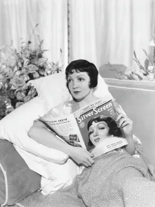 Claudette Prints: Claudette Colbert with copy of Silver Screen magazine which has her on the cover, 1933
