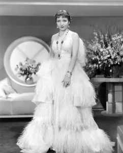 Feathers Prints: Claudette Colbert, in GILDED LILY, 1935, in Travis Banton gown trimmed in vulture feathers