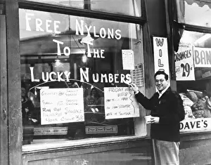 Shortages Prints: Cleveland grocer Max Astor promoting his grocery store with Free Nylons to the Lucky Numbers'