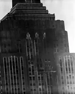 Smoke Prints: A close up view of damage to the south side wall of the Empire State Building the day after a B-25 Bomber accidently