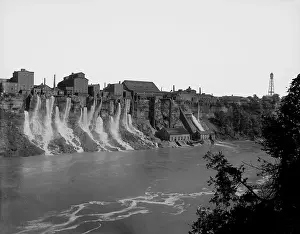 Niagara Falls Prints: A cluster of factories built on and into the walls of the Niagara River Gorge